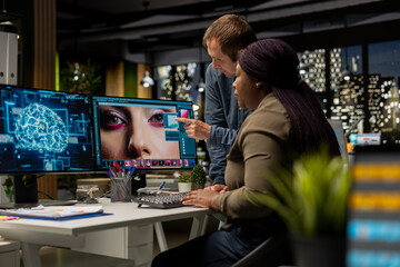 Diverse photo editing team use neural networks for retouching materials, machine learning and editing new photo content online. Professional designers using digital software and AI.