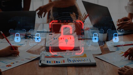 A dynamic business meeting scene featuring hands engaged in discussion around data analysis reports, highlighted by a digital lock icon symbolizing security and protection. Raster