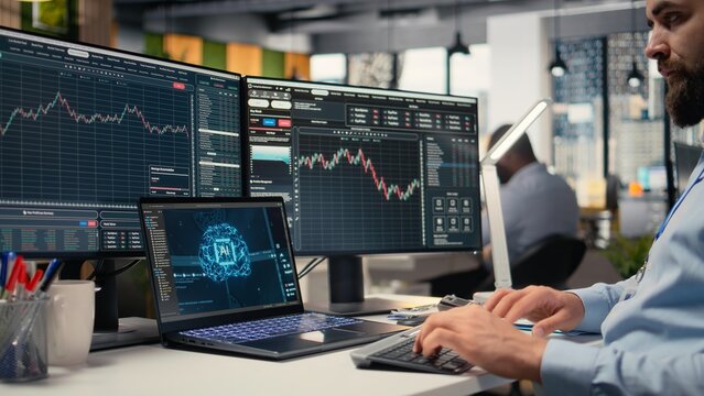 Stockbroker using deep learning technology on laptop to assess stock market volatility. Prop firm worker using AI assistant software on notebook to evaluate portfolio analytics reports