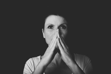 Businesswoman thinking about important decision in studio