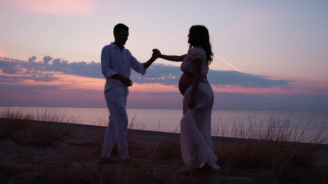 The Happy Dance Of A Couple At The Beach 