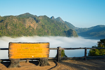 View of the mountains and sky with sign board of Sui Thang Viewpoint at Doi Pha Hom Pok National Park in Chai Prakan district of Chiang Mai province.