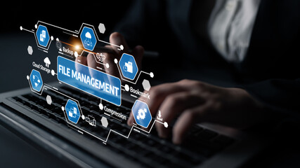 A professional setting showcasing file management technology with cloud storage and data...