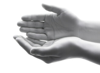 Caucasian womans hands cupped together in black and white. Charity and offering concept with open palms of help. Isolated on white.