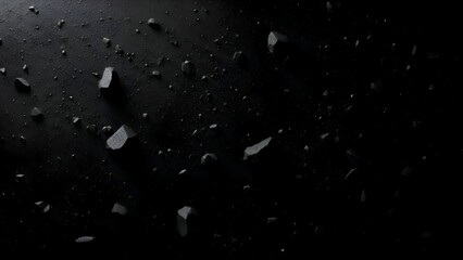 Dark Background with White Specks and Debris.