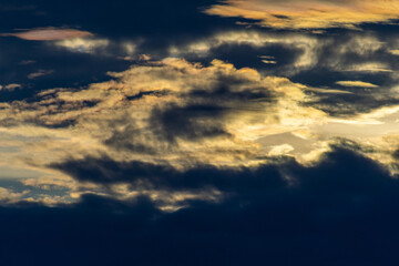 Cloudscape, Colored Clouds at Sunset near the Ocean in a Tropical Climate in Venezuela