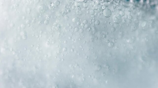 Super Slow Motion Shot of Flowing Bubbles in Water at 1000 fps.