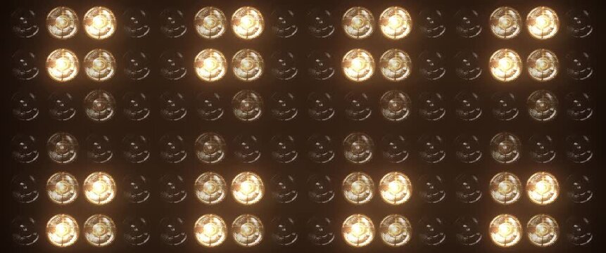Widescreen flashing lights with bright warm lamps pulsing in patterns, perfect for music videos, club events, and show intros, concert visuals and dynamic stage backgrounds