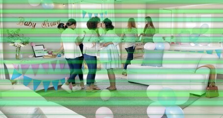 Smiling women gathering around expectant woman in light blue dress at living room, Baby Shower sign