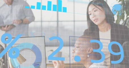 Reviewing team of four examining analytics in modern office, business casual, monitor, tablet, 2