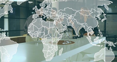 Discussing, three colleagues in suits leaning around bar-height table in office, world map overlay