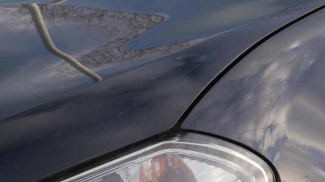 car bonnet, 2012 suv vehicle, close up, open hood pushed down to engage latch catch, closed, click sound