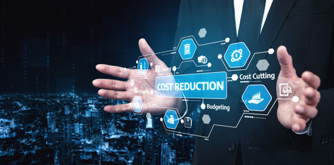A businessman interacts with virtual icons representing cost reduction and financial analytics in an innovative urban environment, showcasing modern business strategies. Tessel