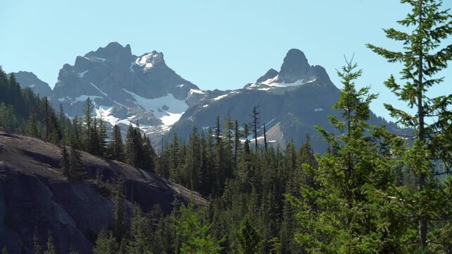 Sea to Sky Highway Peaks in Sun 4K UHD.Mountain peaks in the sun along the Sea to Sky highway in BC Canada.
