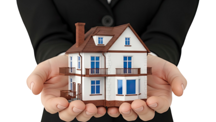 Hands holding a miniature house model