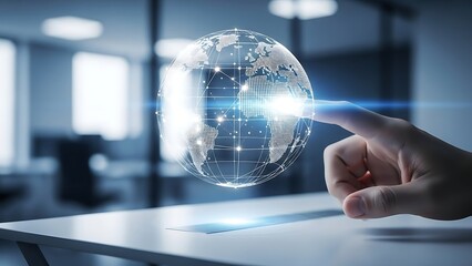 person interacting with a glowing digital globe on a table in a modern office space with blurred background