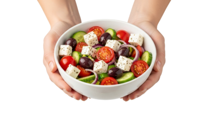 Fresh vegetable salad served in a bowl held by hands isolated on transparent background