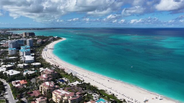Grace Bay Beach At Providenciales In Overseas Territory Turks And Caicos Islands. Caribbean Beach. Tropical Scenery. Stunning Highrise Buildings. Grace Bay Beach In Turks And Caicos Islands.