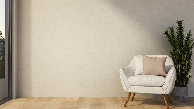White sofa chair and cushion on wooden parquet floor and pot plant and glass door in plain wall room