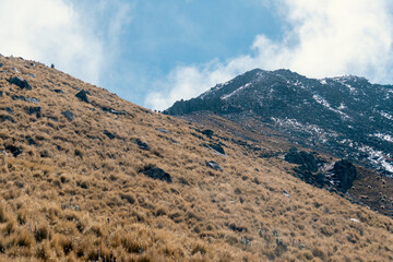 La malinche volcano landscape with dry grass and rocky peak