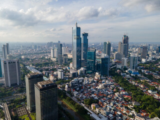 Obraz premium Aerial View of Jakarta Business District with Skyscrapers at Sunset