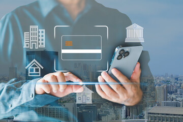 Online payment via smartphone with credit card hologram icons. Digital Installment payments for houses and condominiums. mobile shopping, and contactless payment.