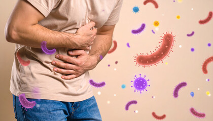 Man holding stomach pain with colorful bacteria illustration around showing gut health and digestion issues abdomen and colon