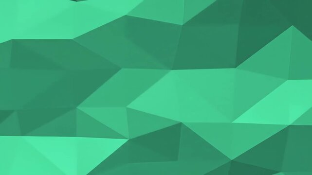 Abstract geometric background with low poly design in shades of green.
