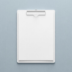 Blank white clipboard on light blue background for notes