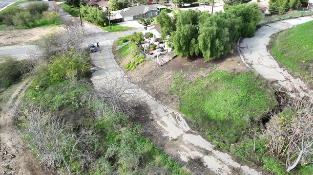 A Drone inspecting a damaged road from and Aerial Views