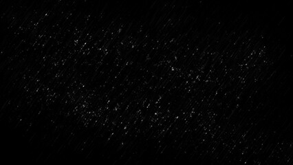 Obraz premium Winter freeze motion of white snow coming down, isolated on black background. Blurred snowfall texture overlay