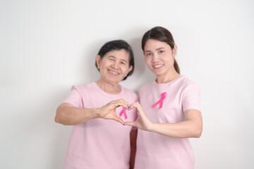 Couple woman with pink Ribbon for Pink October Breast Cancer Awareness month, May Women Health, November Birth Parents Adoption, women rights, Empowerment, March International Women day and Cancer day
