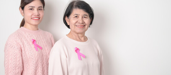 Couple woman with pink Ribbon for Pink October Breast Cancer Awareness month, May Women Health, November Birth Parents Adoption, women rights, Empowerment, March International Women day and Cancer day