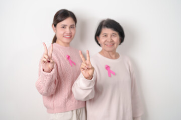 Couple woman with pink Ribbon for Pink October Breast Cancer Awareness month, May Women Health, November Birth Parents Adoption, women rights, Empowerment, March International Women day and Cancer day