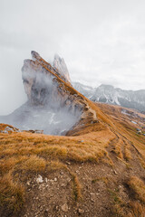 Scenic landscape view of the Dolomites Alps featuring the Odle mountain range and Seceda peak in Italy. Captures dramatic alpine scenery,