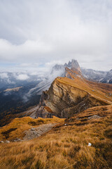 Scenic landscape view of the Dolomites Alps featuring the Odle mountain range and Seceda peak in Italy. Captures dramatic alpine scenery,