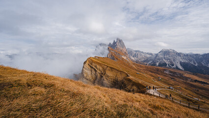 Scenic landscape view of the Dolomites Alps featuring the Odle mountain range and Seceda peak in Italy. Captures dramatic alpine scenery,