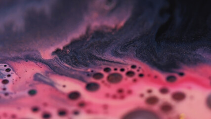 Shimmer art. Oil texture. Defocused pink purple color paint in water marble sparkling liquid droplet floating on abstract background.