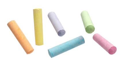 scattered pastel chalk sticks on a transparent background representing art and educational supplies.