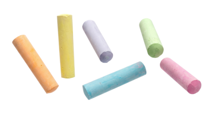 scattered pastel chalk sticks on a transparent background representing art and educational supplies.