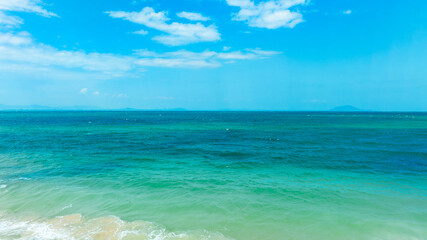 Panorama of clear sky and summer sea water background for summer vacation concept.with sunlight of beautiful cloudy blue sky with white altocumulus clouds.with