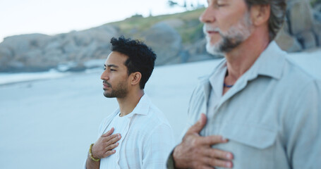 Calm, men and meditation for inner peace, beach and routine for mental health, breathing and outdoor. People, inhale and spiritual awareness in nature, stress relief and space on break or healing