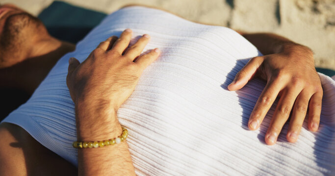 Hands, man and breathing for yoga outdoor with meditation, spiritual healing and mindfulness. Above, male person and reiki for fitness, holistic balance and inhale exercise for inner peace at beach - Powered by Adobe