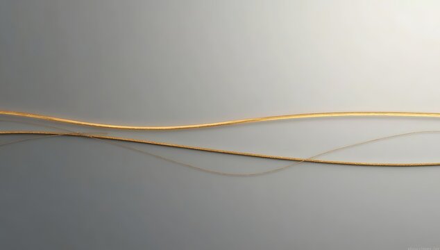A thin gold line cutting cleanly through a matte gray field