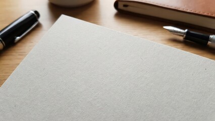 Light grey paper surface with a subtle grain for a professional look