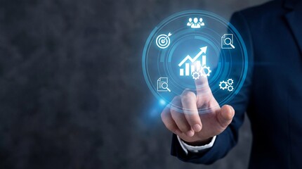 Professional person touches a bright glowing blue digital interface with busines