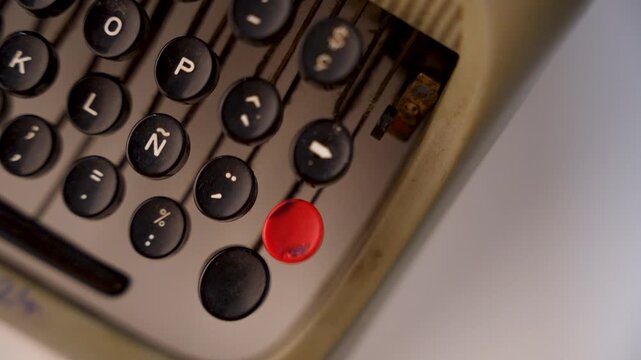 Super slow motion of the keys of an old typewriter. Vintage. 100 fps