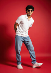 Smiling Man in Sunglasses and Casual Attire