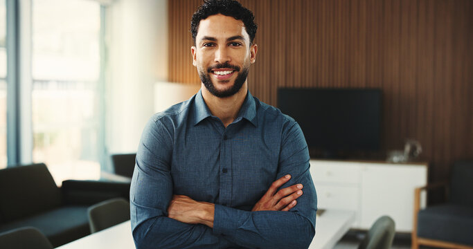 Realtor, portrait or man in office with arms crossed, pride or experience as property seller. Smile, career or real estate agent in agency with confidence, job goals or profession in housing market.