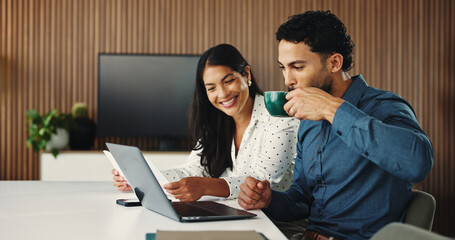 Business people, coffee and laptop in office with document for discussion, proposal or partnership....